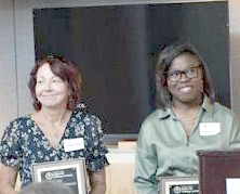 Katie Dixon (r) and Susan Steinbis (l) display their 2025 Kauffman awards.